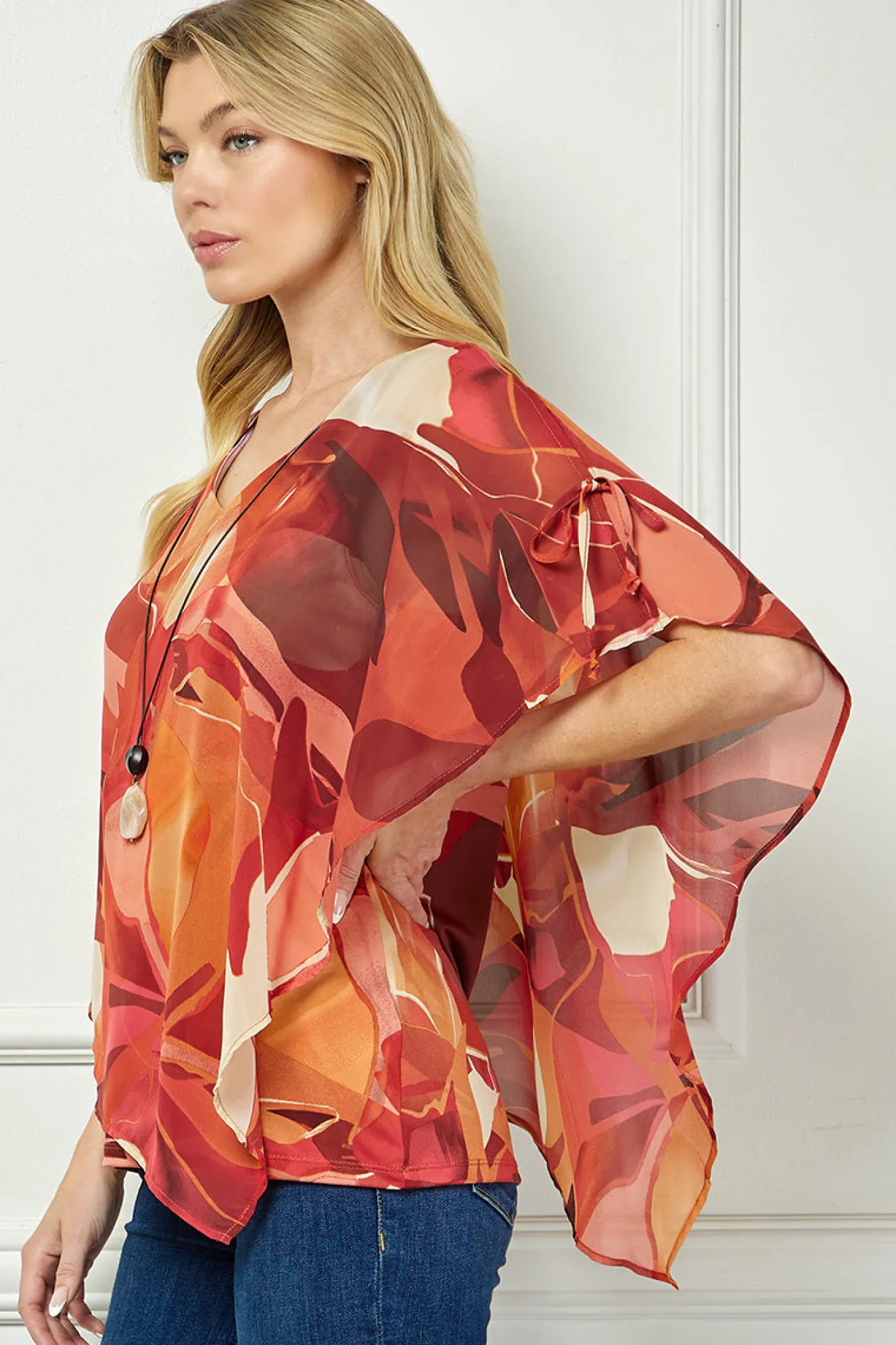 Cold Shoulder V-Neck Hanky Hem Poncho Top in Ivory/Marigold/Orange