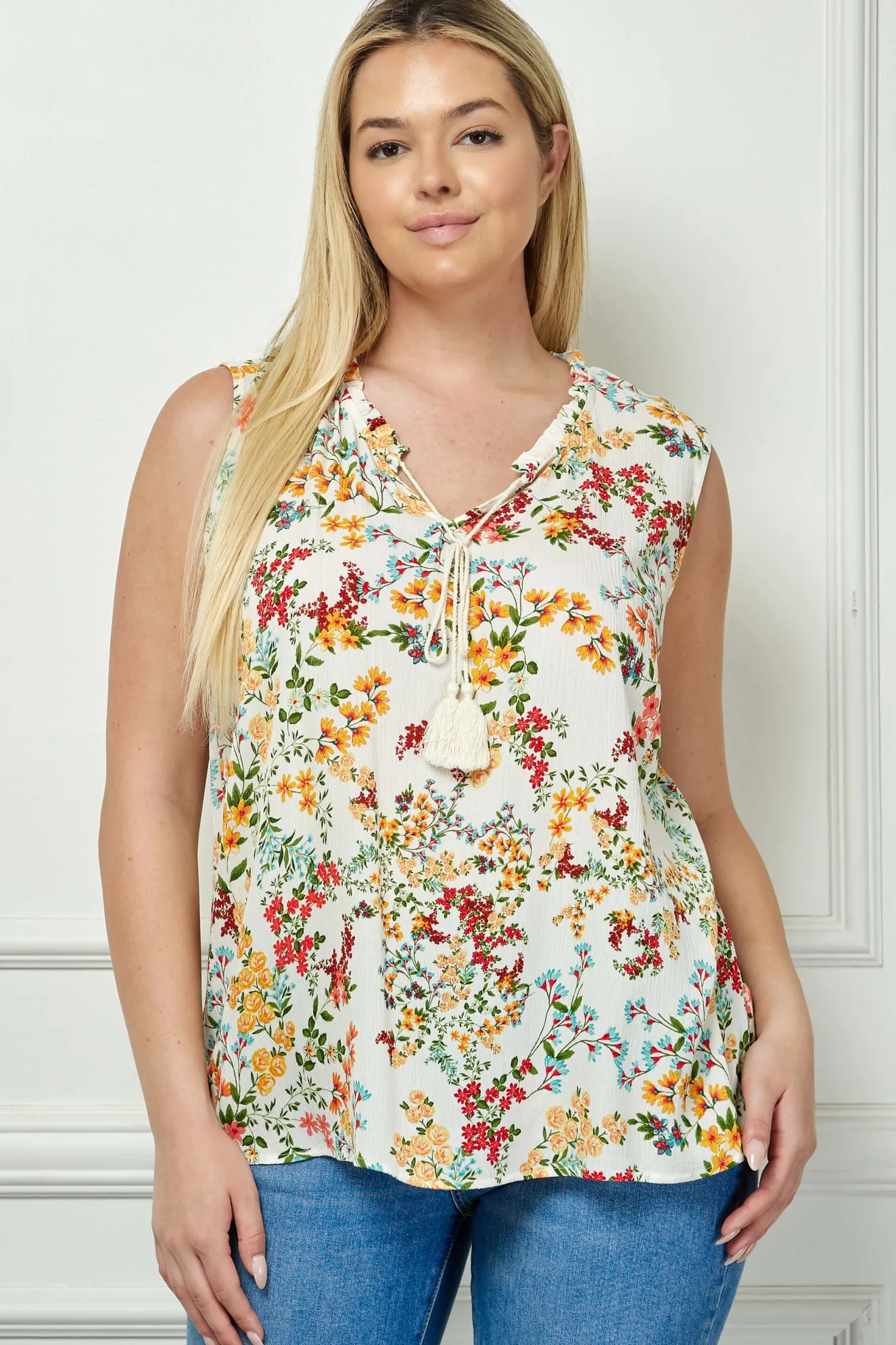 Sleeveless Ruffle Neck Tassel Blouse in Ivory - Plus